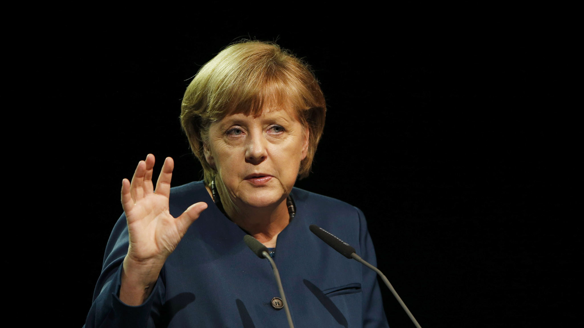 German Chancellor Angela Merkel gestures as she gives a speech at the German sustainable development congress in Berlin, May 13, 2013. REUTERS/Fabrizio Bensch (GERMANY - Tags: POLITICS ENVIRONMENT HEADSHOT)