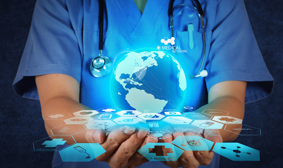 Medical Doctor holding a world globe in her hands as medical network concept