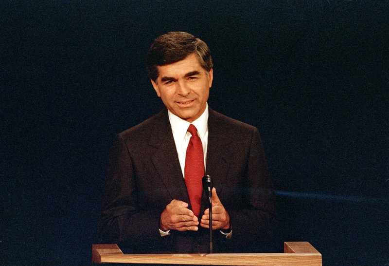 Dukakis credits Bush with helping to end Cold War