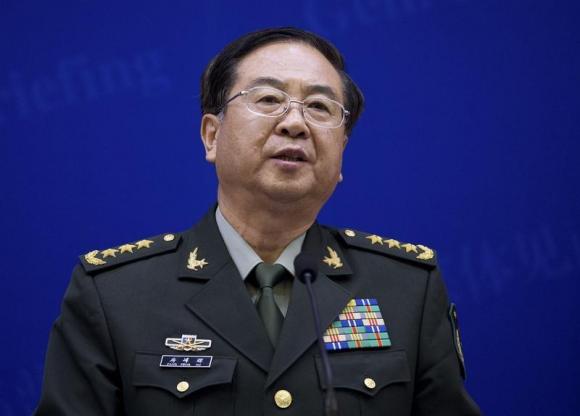 Chief of the general staff of China's People's Liberation Army Fang speaks during a press briefing with U.S. Joint Chiefs Chairman General Dempsey in Beijing