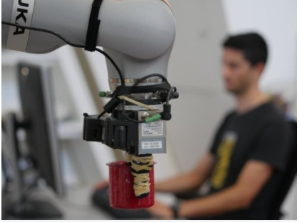 Robot is capable of grasping objects after identifying progress