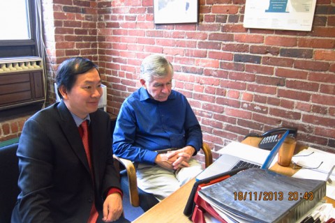 From left to right: BGF's editor in chief Tuan Nguyen and chairman Michael Dukakis in the Conference room.