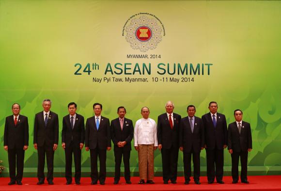 ASEAN leaders pose for pictures during the opening ceremony of the 24th ASEAN Summit in Naypyidaw